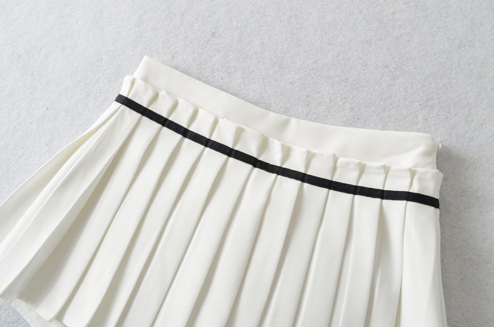 A. Odette Mini Bow Pleated Skirt